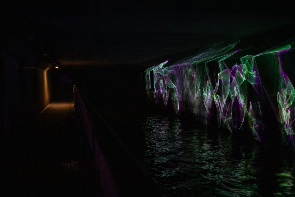© Camille Crucifix Laser beams are projecten upon the Senne river in the Sewer Museum in Brussels